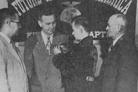 Three Kingfisher men were named honorary members of the local FFA chapter at its banquet Monday evening. Above at left is Thomas Francis. Henry Avery receives his pin from Monroe Kottwitz. E.P. Johnson is at right. The banquet was held to honor these thre