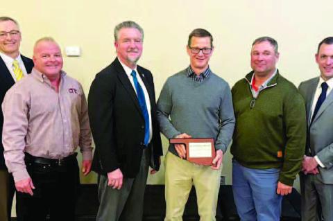 CHISHOLM TRAIL Technology Center honored Wheeler Brothers Grain Co. as its Business Partner of the Year during an appreciation banquet on Wednesday. Pictured from the banquet are, from left: State Sen. Darcy Jech; Dan Craig, CTTC small business manager; P