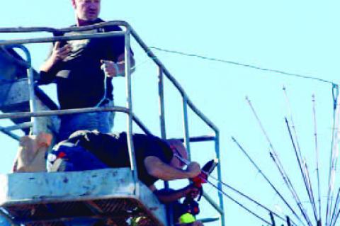 CORY MUEGGENBORG (right) was named the 2025 Citizen of the Year at the Kingfisher Chamber of Commerce’s annual banquet Monday. Pictured above is his wife, Carrie Mueggenborg, second from right, accepting on his behalf. Joining her are Chamber Executive 