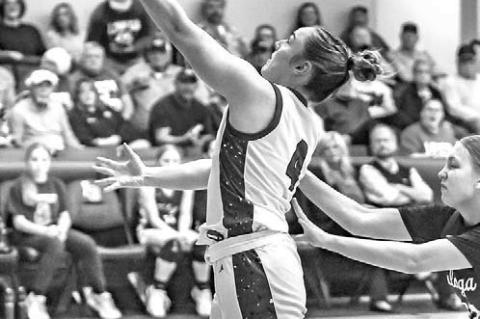 PAIGE WHEELER scored 18 points in Lomega’s regional championship win over Dover. [Photo by Chris Simon/www. simon-sports-photos.smugmug.com]