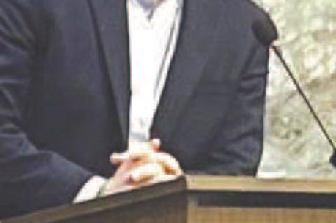 NEWLY-APPOINTED Assistant City Manager Jonah Humes (above) addresses the Kingfisher City Commission during Monday’s meeting. Also at the meeting was Traci King (far right), a loan analyst in the Oklahoma Water Resources Board’s Financial Assistance Di