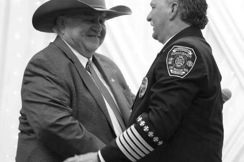 Retiring fire chief presented with surprise honor