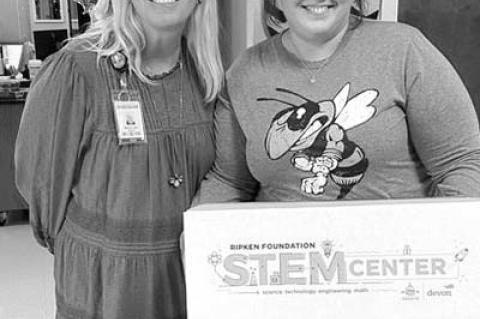 Devon makes donation to KPS STEM program