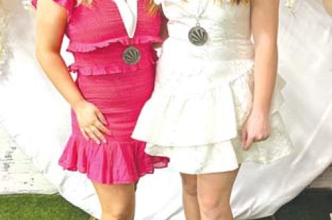 FORMER DYW of Oklahoma Ella Dierlam, left, with new title holder, Kingfisher’s Kylie Hood. [Photo provided]