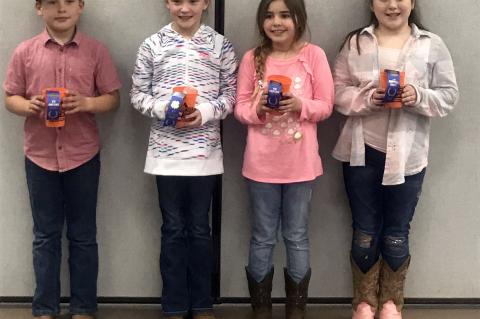 The Lomega 4-H team consisting, from left, Breckon Murray, Josey Nusz, Lasi Grabow and Sadee Wright won the livestock quiz bowl recently during the Kingfisher County Spring Livestock Show.             [Photo provided]