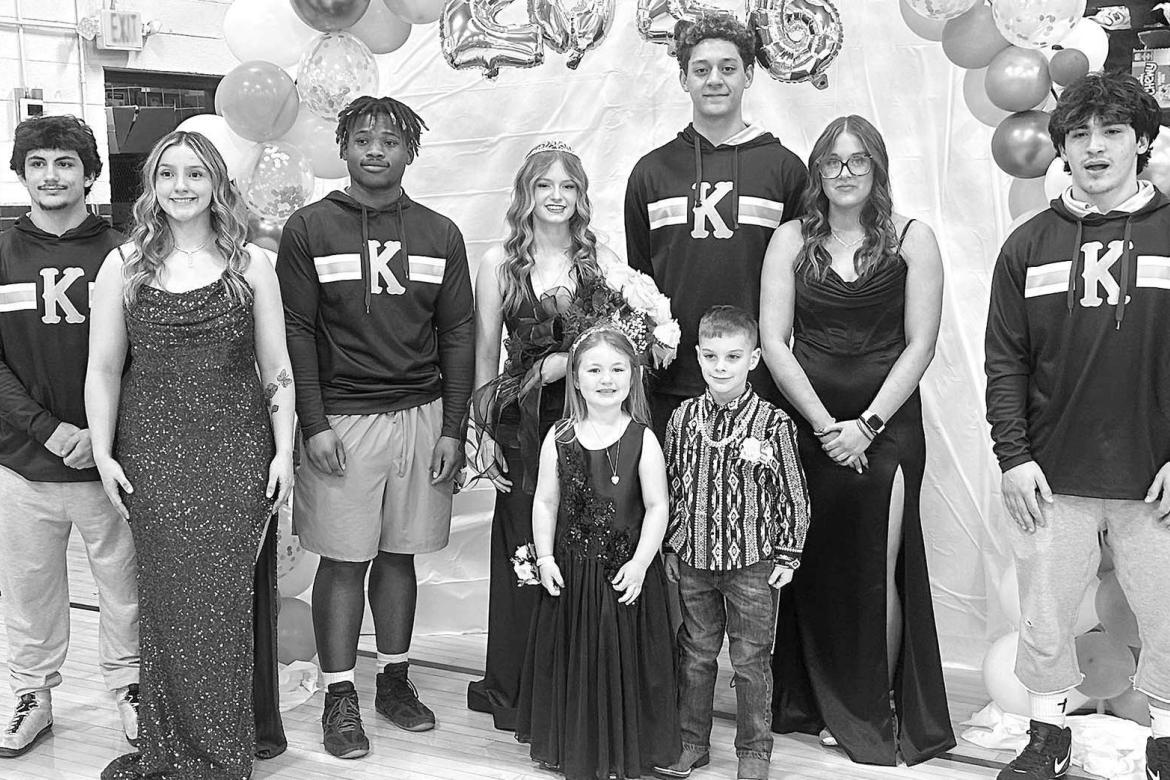 WRESTLING ROYALTY – Andrew Takape was named the KHS wrestling homecoming king and Sydnie Toepfer crowned the queen at coronation ceremonies on Tuesday at Heritage Gym. Members of the homecoming court were, from left, Brayden Kochenower, Cattie Crum, TJ 