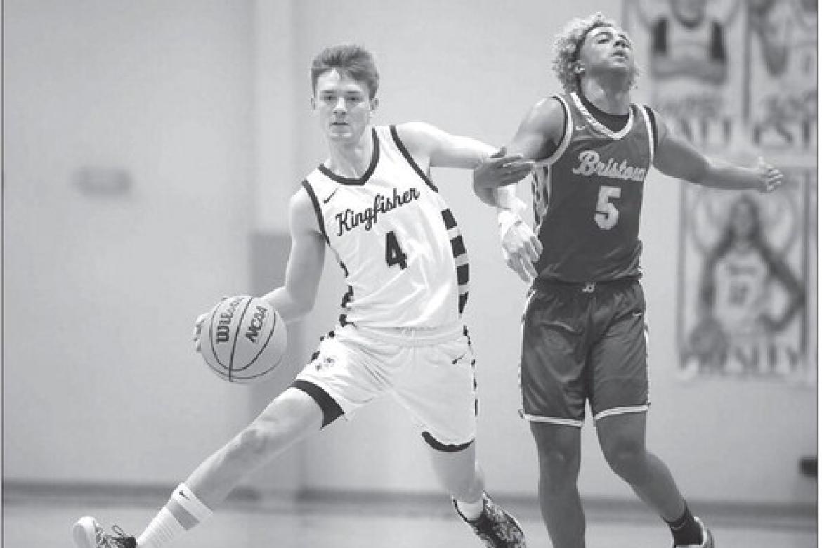KINGFISHER GUARD Cash Laird (4) and Bristow’s TJ Wilson got tangled up during the first half of the Jackets’ regional win in Cushing on Tuesday night. [Photo by Russell Stitt/www.stitt.smugmug.com]