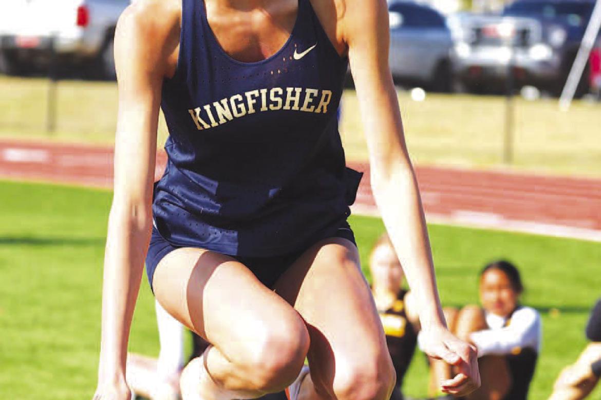 KINGFISHER HIGH SCHOOL sophomore Ela Hartman reacts after just missing a height in the high jump competition at the Fairview Track and Field Meet on Tuesday. Hartman finished second in the event and in the long jump as well. For complete results from the 