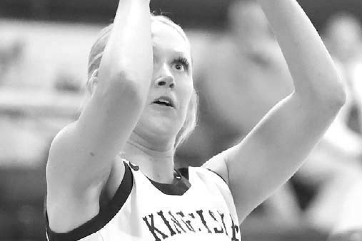 KHS SENIOR Abbie Myers shoots a short jumper during the first half of Kingfisher’s district championship game against Cushing. She scored 12 in the Lady Jackets’ victory. [Photo by Russell Stitt/www.stitt.smugmug.com]