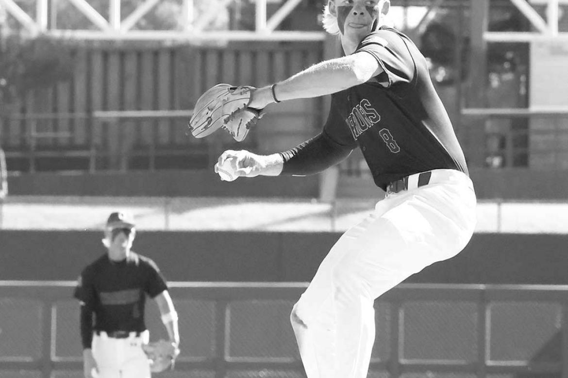 EASTON ROBY delivers a pitch during last fall’s state championship game. Roby picked up one of Okarche’s wins in Alabama last week as the Warriors went 3-1 on their Spring Break trip. [KT&amp;FP Staff Photo]