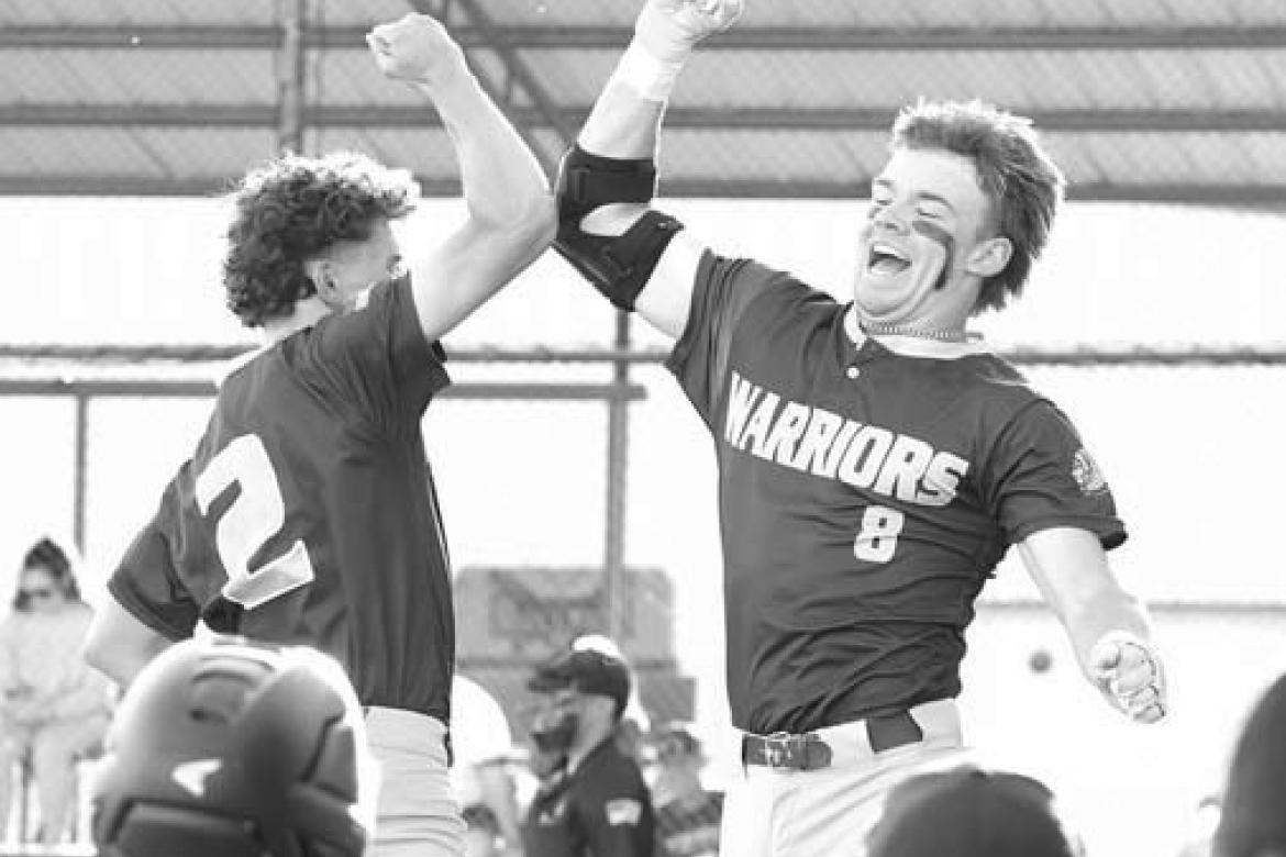 OKARCHE SENIORS Easton Roby (8) and Jett Mueggenborg (2) celebrate after Roby hit a home run in the first inning Monday at Dover. [KT&amp;FP Staff Photo]