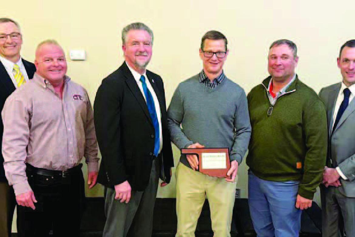 CHISHOLM TRAIL Technology Center honored Wheeler Brothers Grain Co. as its Business Partner of the Year during an appreciation banquet on Wednesday. Pictured from the banquet are, from left: State Sen. Darcy Jech; Dan Craig, CTTC small business manager; P