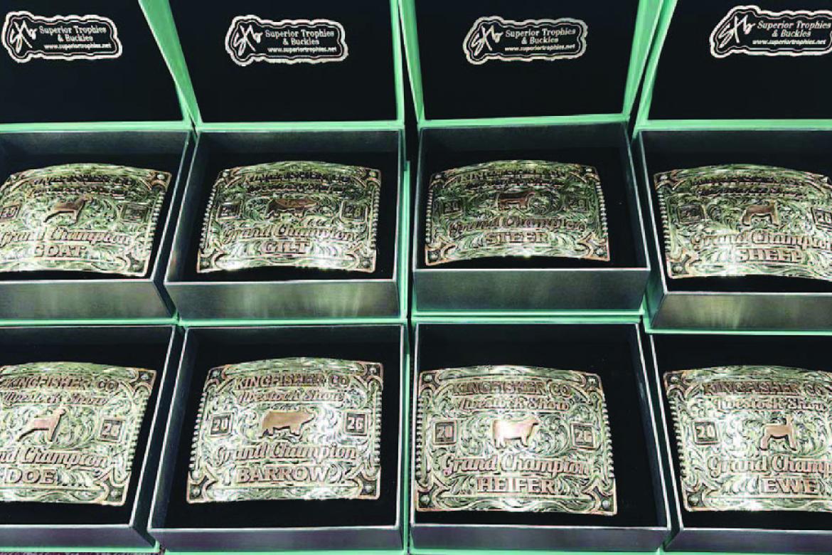 BUCKLE UP – Pictured are the buckles that will be awarded to the grand champions (above) at the Kingfisher County Livestock Show next week as well as the showmanship winners (right). There will also be buckles awarded to reserve grand champs and an over