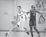 KINGFISHER GUARD Cash Laird (4) and Bristow’s TJ Wilson got tangled up during the first half of the Jackets’ regional win in Cushing on Tuesday night. [Photo by Russell Stitt/www.stitt.smugmug.com]