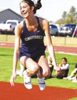 KINGFISHER HIGH SCHOOL sophomore Ela Hartman reacts after just missing a height in the high jump competition at the Fairview Track and Field Meet on Tuesday. Hartman finished second in the event and in the long jump as well. For complete results from the 