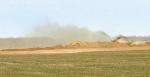 CHARLIE PICKLE supplied the above photo of fly ash blowing out of a waste pit and said Hennessey residents could experience the same issue if a proposed commercial waste site northeast of the town is approved. [Photo provided]