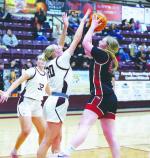 CASHION SENIOR Jaylee Harp (20) blocks a shot attempt by a Watonga player during the first half of the Lady Wildcats’ eventual four-point win in their Class 2A district championship game. [KT&amp;FP Staff Photo]