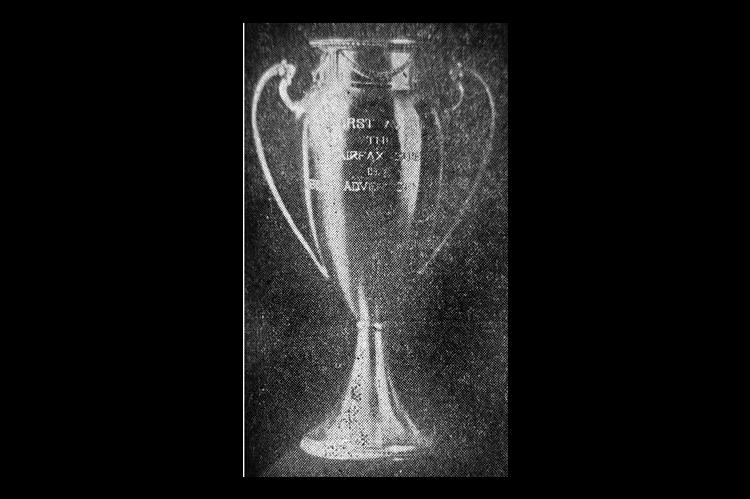 This is the loving cup awarded The Times at the state press meeting in Bristow, in the Better Advertising contest. The donor was The Fairfax Chief, winner of the front page cup last year. [ As of 2026, this cup is still on display at The Times &amp; Free Press]