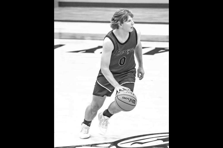 LANCE YOST made nine 3-pointers and scored 35 points Tuesday in Lomega’s win at Kremlin-Hillsdale. [Photo by Chris Simon/www.simon-sports-photos.smugmug.com]