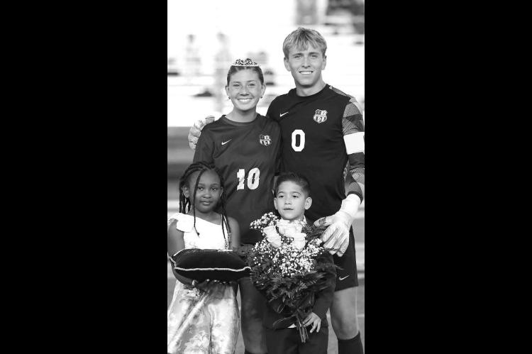 Seniors Elijah Click and Harper Evans were crowned the Kingfisher High School soccer homecoming king and queen Wednesday night. The coronation was held at halftime of the boys game against Alva. Junior attendants were Ramayiah McCarty, the daughter of Rodney and Dyamonique McCarty, and Lucas Campos, the son of Erika Gamez. KHS swept Alva in the district games. [KT&amp;FP Staff Photo]