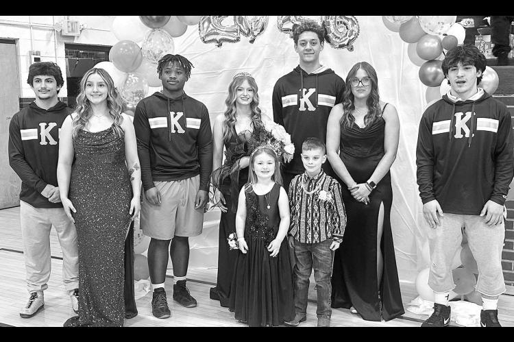 WRESTLING ROYALTY – Andrew Takape was named the KHS wrestling homecoming king and Sydnie Toepfer crowned the queen at coronation ceremonies on Tuesday at Heritage Gym. Members of the homecoming court were, from left, Brayden Kochenower, Cattie Crum, TJ Washington, Toepfer, Takape, Emma McLean and Abe Prieto. Junior attendants were Milo Hellwege, the daughter of Elliott and Hillary Hellwege, and Kasen Jones, the son of Drake and Tiffany Jones. [KT&amp;FP Staff Photo]