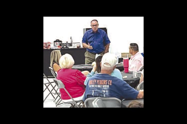 HENNESSEY TOWN Trustee David Jones tells citizens Wednesday night about how he has dealt with resistance, arguments and confrontation while on the Hennessey Board of Trustees and Utilities Authority. [Photo by Barb Walter]