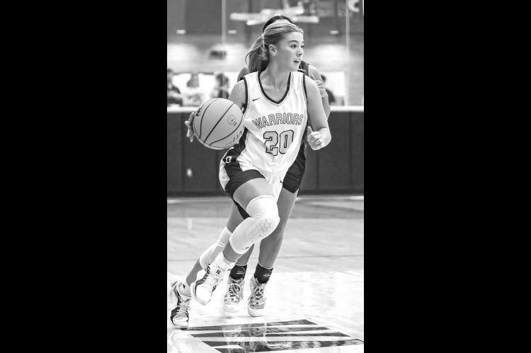 SENIOR SCOUT Payne had some big moments in helping her team win a third consecutive tournament title at Coyle over the weekend. [Photo by Chris Simon/www.simon-sports-photos. smugmug.com]