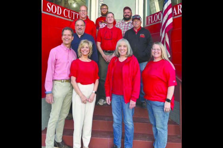 WALTER BUILDING CENTER staff today includes, from left: front row, Brian Walter, Liz Walter, Phyllis Click and Dionne Harrison; second row, Gary Austin, Doug Smiley and Mark Westman; and back row, Chris Blair, Larry Bilger and Keil Larsen.