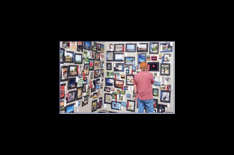 COUNTY FAIR attendees can take in a number of exhibits later this week, such as this one of judged photos from the 2024 fair. See our story for a complete list of events. [KT&amp;FP Staff Photo by Twila Adams]