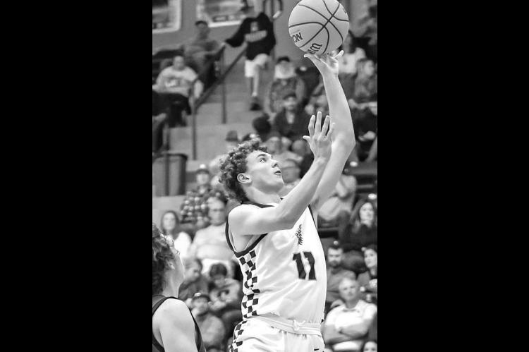 JETT MUEGGENBORG has helped lead Okarche to an 11-0 record entering the Christmas holiday. [Photo by Chris Simon/ www.simon-sports-photos.smugmug.com]