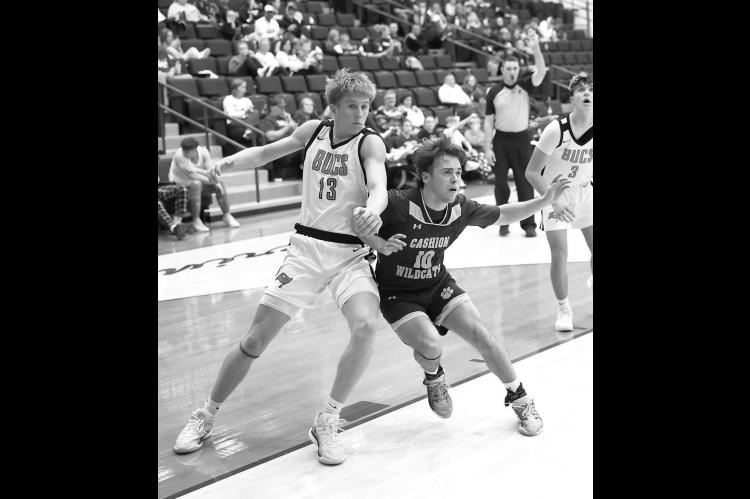 CASHION’S Kamden Miller (10) battles for position in the championship game against Tonkawa last weekend in Garber. [Photo provided]
