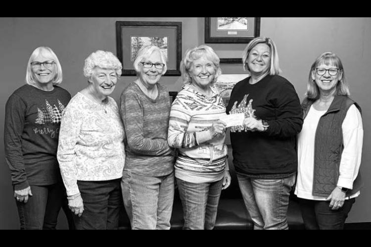 Retired educators make donation to Santa’s Toyland