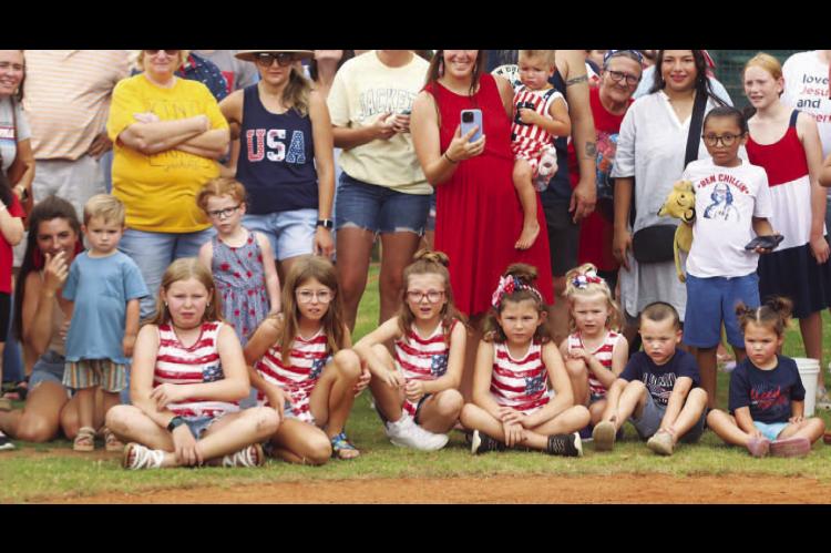 INTENSE FOCUS – As this group of spectators from the 2024 event show, the annual turtle races presented by the Kingfisher Lions Club are always a big hit at Homier Field as part of the Fourth of July festivities. [KT&amp;FP Staff Photo]