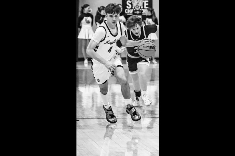 CASH LAIRD led KHS with 16 points in Kingfisher’s victory over the Cache Bulldogs last Tuesday. [Photo by Chris Simon/ www.simon-sports-photos.smugmug.com]