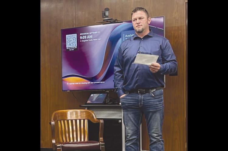 BRAD WITTROCK, KPS board member, read from a prepared message to begin the Kingfi sher County Excise Board meeting Wednesday morning. The school board had submitted a budget approximately $2 million more than was eventually approved. [KT&FP Staff Photo]