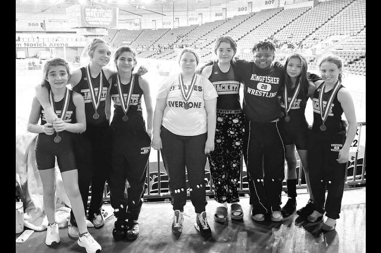 JUNIOR HIGH ALL-STATE – Kingfisher’s girls took part Thursday in the 50th annual Junior High All-State Wrestling Tournament at State Fair Arena in Oklahoma City. Several of them earned medals at the event. In the middle school division, Sophie Ellis w