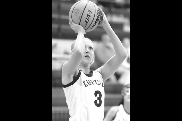 KHS SENIOR Abbie Myers shoots a short jumper during the first half of Kingfisher’s district championship game against Cushing. She scored 12 in the Lady Jackets’ victory. [Photo by Russell Stitt/www.stitt.smugmug.com]