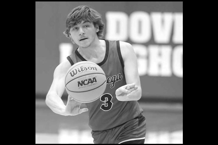 LOMEGA SENIOR Brenden Uhlenhake makes a pass during his team’s regional consolation championship win Saturday. [KT&amp;FP Staff Photo]