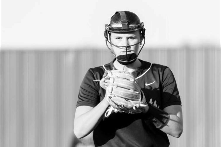 KINLEE EAST prepares to hurl a pitch during her three-inning no-hitter Thursday as KHS down the OKC Broncos 12-0 on Senior Night. [Photo by Russell Stitt/www.stitt.smugmug.com]