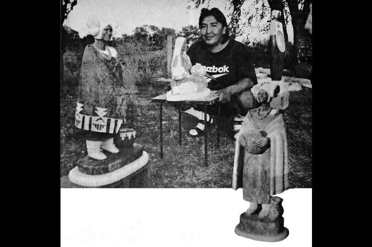 SCULPTOR Matthew Panana poses with some of the works he’s completed during his recent hiatus in Kingfisher.