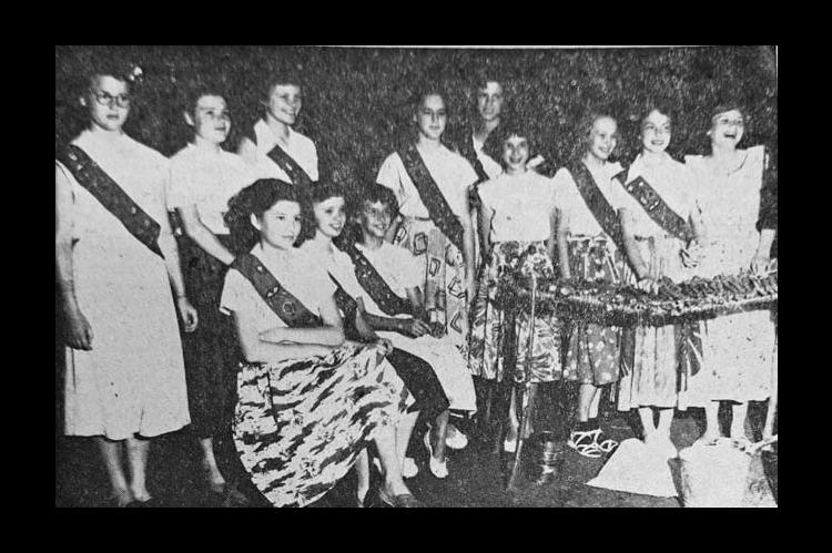 The 12 girls shown above received the Curved Bar award, the highest honor given in intermediate Girl Scouting, at the Friday evening program of the annual Girl Scout day camp, held last week at Oklahoma park. They are, left to right, standing: Carol Campbell, Linda Lorenz, Sandra Pappe, Mary Lyle Dulany, Barbara Buchanan, Mary Beth Phillips, Anna Lou Larrabee, Clydean Rivers and Anita Brasher; seated: Carolyn Mills, Carol Ann Crowder and Deanna Dean. (Free Press, June 18, 1951)