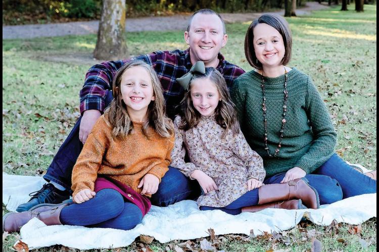 Church calling brings local family home