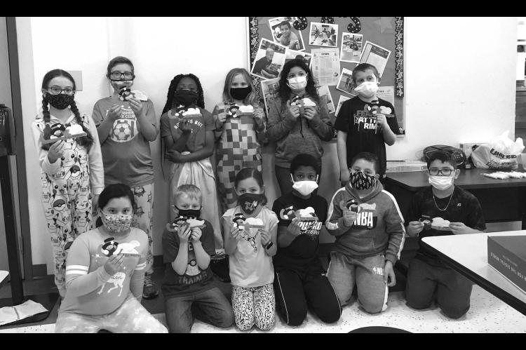 STARS students craft bookmarks for Meals on Wheels