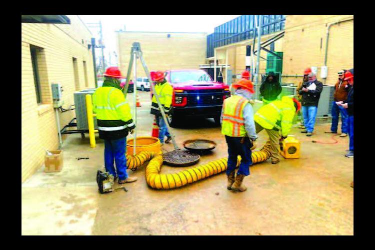 PIONEER CREWS work on a training project in conjunction with Chisholm Trail Technology Center. The program that will help with broadband expansion was made possible through an ARPA grant. [Photo provided]