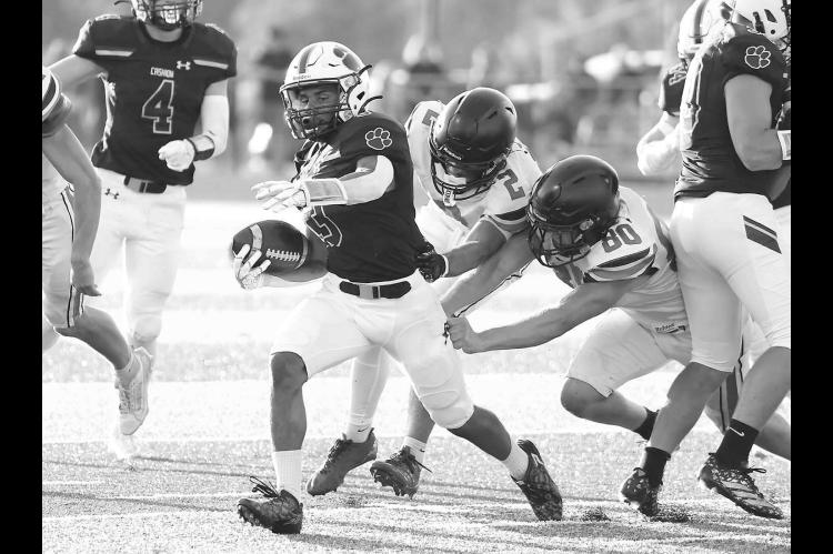 ALMOST HAD HIM – A pair of Crescent defenders got their hands on Cashion’s Grayson Davis, but couldn’t hold on during the first quarter of Friday’s game. Davis turned this play into a 20-yard touchdown reception to give the Wildcats a 14-0 lead. [KT&amp;FP Staff Photo]