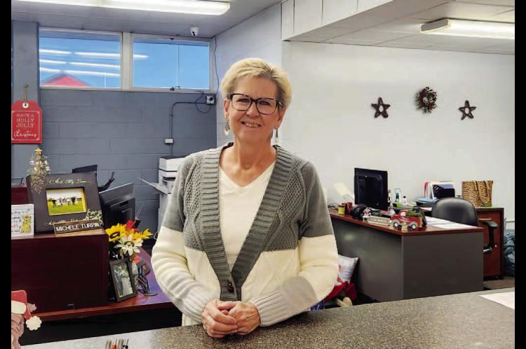 LONGTIME KINGFISHER County Court Clerk Lisa Markus stands at the front desk of the office in which she’s worked for 39 years. She’s been the court clerk for the last 12, but is retiring at the end of this year. [KT&amp;FP Staff Photo]