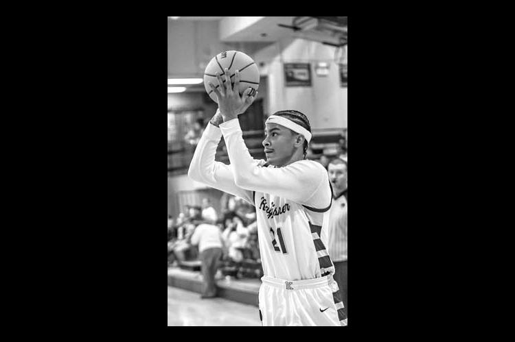 ARIK LUKE shoots one of 13 made 3-pointers for KHS during an 80-45 home win Tuesday. [Photo by Chris Simon/ www.simon-sports-photos.smugmug. com]