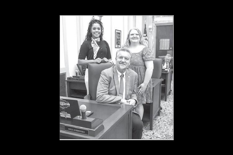 DISTRICT 59 Representative Mike Dobrinski (seated) is pictured with recent House pages Aliana Lawson (left) and Gracie Fuksa (right). [Photo provided]