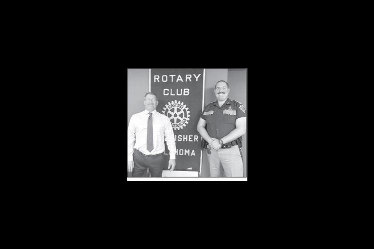 ROTARY SPEAKER – Adam Post, right, a Kingfisher native and trooper for the Oklahoma Highway Patrol aircraft division, made a presentation to Kingfisher Rotarians last Tuesday of the drone capabilities and functions of the service he’s been a` full-tim