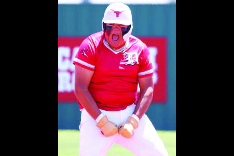 IVAN RUIZ reacts after hitting an RBI double against Leedey on Thursday. [KT&amp;FP Staff Photo]